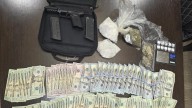 Sandersville man arrested after search seizes guns, drugs and cash: sheriff's office