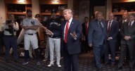 Trump draws cheers and boos while marking 9/11 by attending a New York Yankees game