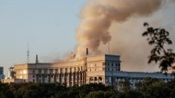 Russia's largest air attack on Ukraine sets fire to main government building