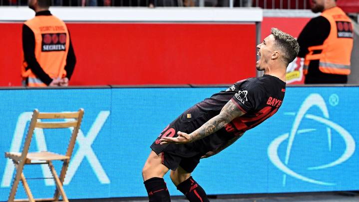 Leverkusen fights past in-form Frankfurt to earn first Bundesliga win