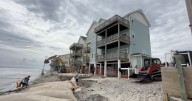 Crews placing sandbags in Buxton as homeowners work to protect their homes