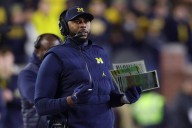 Sherrone Moore won't coach Michigan's next two games. How will they handle his absence?