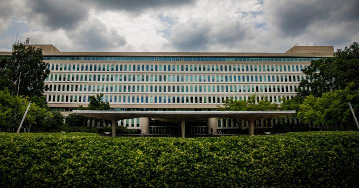 Construction workers fleeing ICE raid climb fences around CIA headquarters