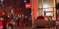 3 people hospitalized after car crashes into downtown restaurant, district fire chief says