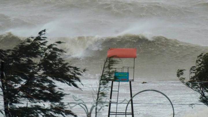 Thousands evacuated and airports shut in Vietnam as typhoon closes in