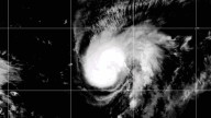 Hurricanes Humberto and Imelda charge toward Bermuda as the tiny island prepares