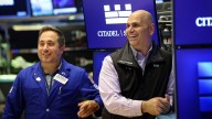 Dow closes at record high, S&P 500 logs winning month, as investors shake off government shutdown concerns