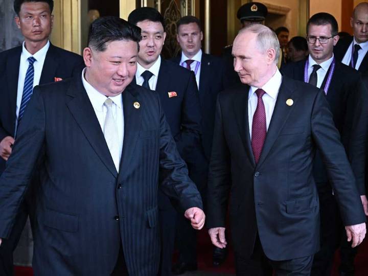 Putin shares limo ride with Kim before extending a Moscow invitation
