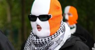 UK court tosses terror charge against Kneecap member
