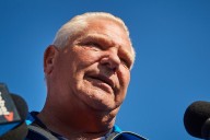 Ontario premier urges Carney to maintain tariff on Chinese EVs despite canola levy