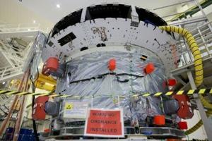 NASA says on track to send astronauts around the Moon in 2026