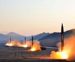 SKorea says North's long-range missiles at 'final stage' as warning shots fired at NK boat