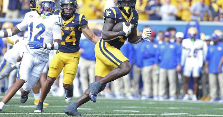 Edwards' short TD run in overtime leads West Virginia over Pittsburgh 31