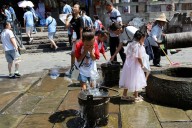 North China posts longest rainy season since 1961, country faces hottest summer