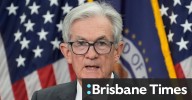 Federal Reserve cuts interest rate, signals two more cuts this year