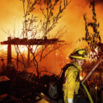 Quick-moving wildfire scorches historic California gold mining town, burning multiple homes
