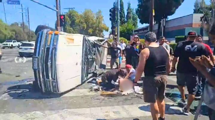 Graphic footage shows group helping bloodied man out of Reseda car wreck