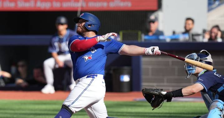 Blue Jays beat Rays 13-4 to win East title