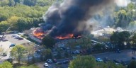 Gunman sets Michigan church on fire while killing at least 1 person and injuring 9, police say