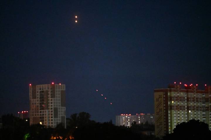Russia attacks Ukraine with sweeping air assault as Putin attends China parade