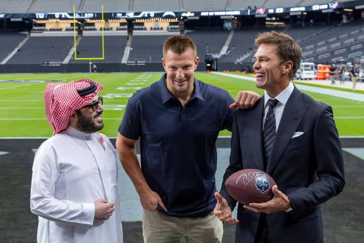 Tom Brady shown sitting in the Raiders’ coaching box during ‘Monday Night Football’