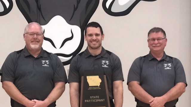 Family ties: Iowa HS football coach's staff includes father, father