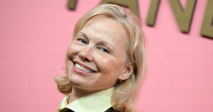 Pamela Anderson Debuts Copper Hair at Paris Fashion Week