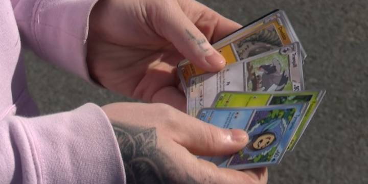Local Pokémon card buyers wait in line for stores to open