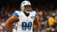 Lions’ Ndamukong Suh denies stomping Aaron Rodgers leg was intentional