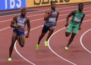 Athletics-Lyles blasts into 200m final with 19.51 seconds