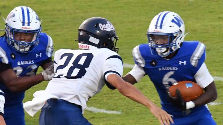 High school football: Wilmington Friends at Woodbridge action in photos