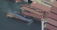 More than 60 containers fall off ship in Long Beach port