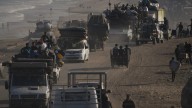 Israeli troops press forward into Gaza City as Palestinians flee