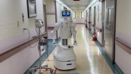 AI robot nurse with creepy 'face' taking over hospital jobs as it patrols halls, delivers meds and tracks patient vitals