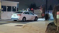Search underway for man who crashed car into FBI's Pittsburgh office gates in 'act of terror'