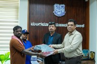 Rohan Corporation distributes safety shoes to civic workers of MCC