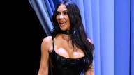 Kim Kardashian stuns in sexy black dress as she shows off her secret tattoo