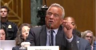 Kennedy tries to defend COVID-19 vaccine stance in raucous Senate hearing