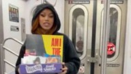 Huge American rapper divides fans as she's spotted flogging new album on the subway
