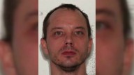 Manhunt underway for person of interest in double murder investigation