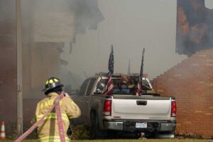 Gunman killed by police after killing 1, injuring 9, setting fire at Michigan Latter