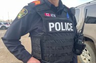 Woman charged after allegedly biting Saskatoon police officer
