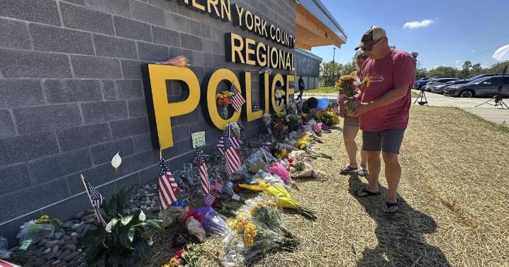 3 officers killed by gunfire in Pennsylvania were hoping to arrest a stalking suspect