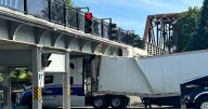 Fredericton News: Transport truck gets stuck under overpass