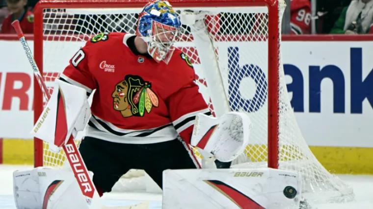Chicago extends 24 year old goalie to $17 million deal