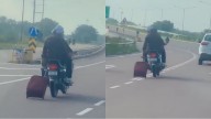 'Highways So Good...': Bizarre Video Of Man Dragging His Luggage Bag From Moving Bike Goes Viral
