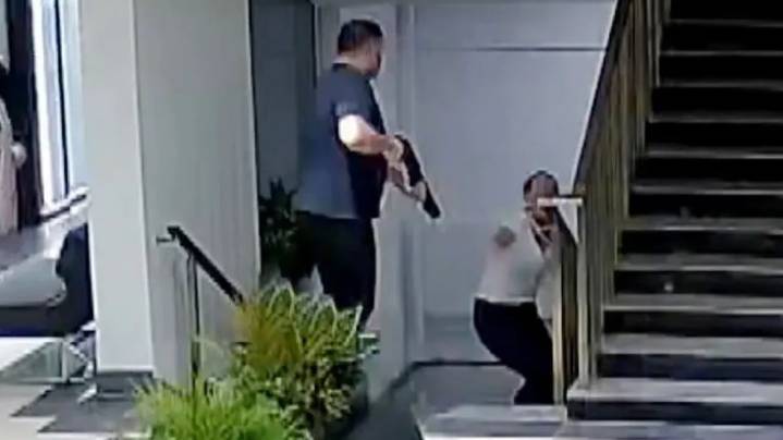 Horror moment crazed husband blasts ex wife three times with shotgun killing her on hospital staircase as patients flee