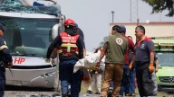 Freight train slams into a bus outside Mexico City, killing at least 10 people