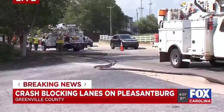 Crash knocks down power poles along Pleasantburg Drive