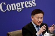 China central bank head pledges data-driven policy to aid recovery